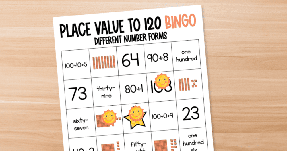 A paper on a desk with Place Value to 120 Bingo written at the top and Bingo boxes below with numbers to 120 represented in different ways