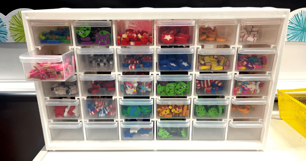 mini-erasers in a white storage container